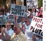 Photo provided by New Mexico State University shows Al Tombaugh, whose father discovered Pluto, at a demonstration at the school on September 1. Clyde Tombaugh also founded the research astronomy department at New Mexico State.